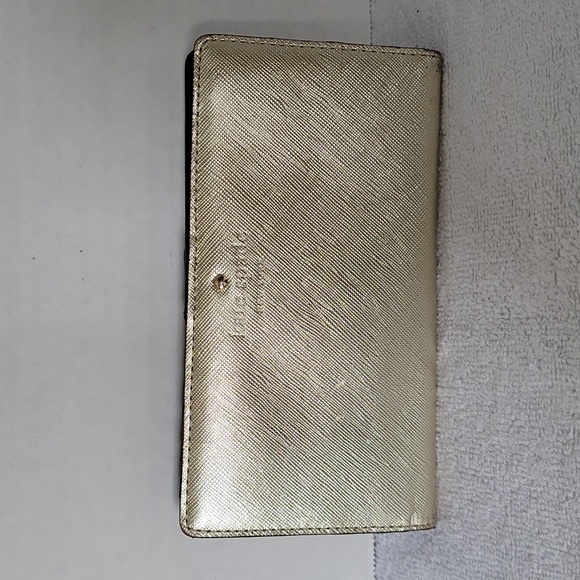 kate spade Handbags - Kate Spade New York gold shimmer long wallet
